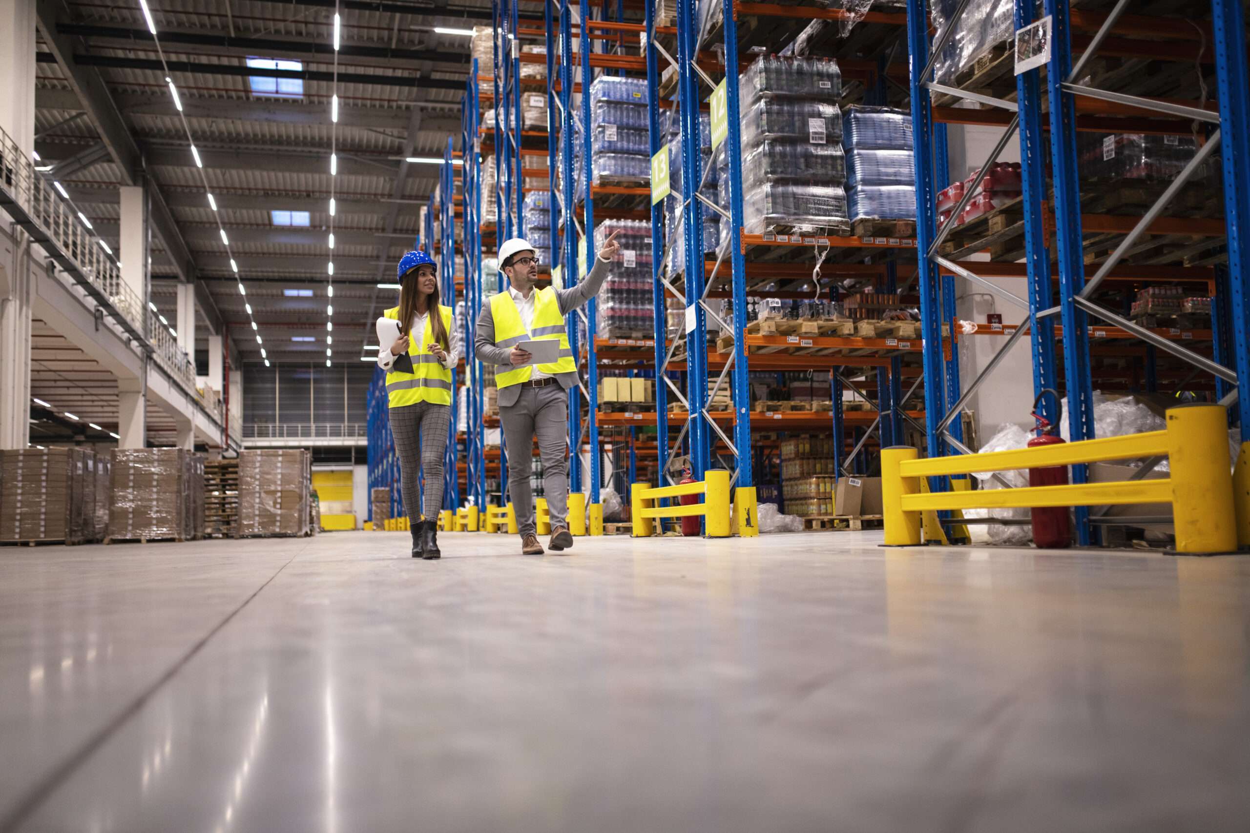 Warehouse Managers Walking Large Storage Department Controlling Distribution Market Scaled